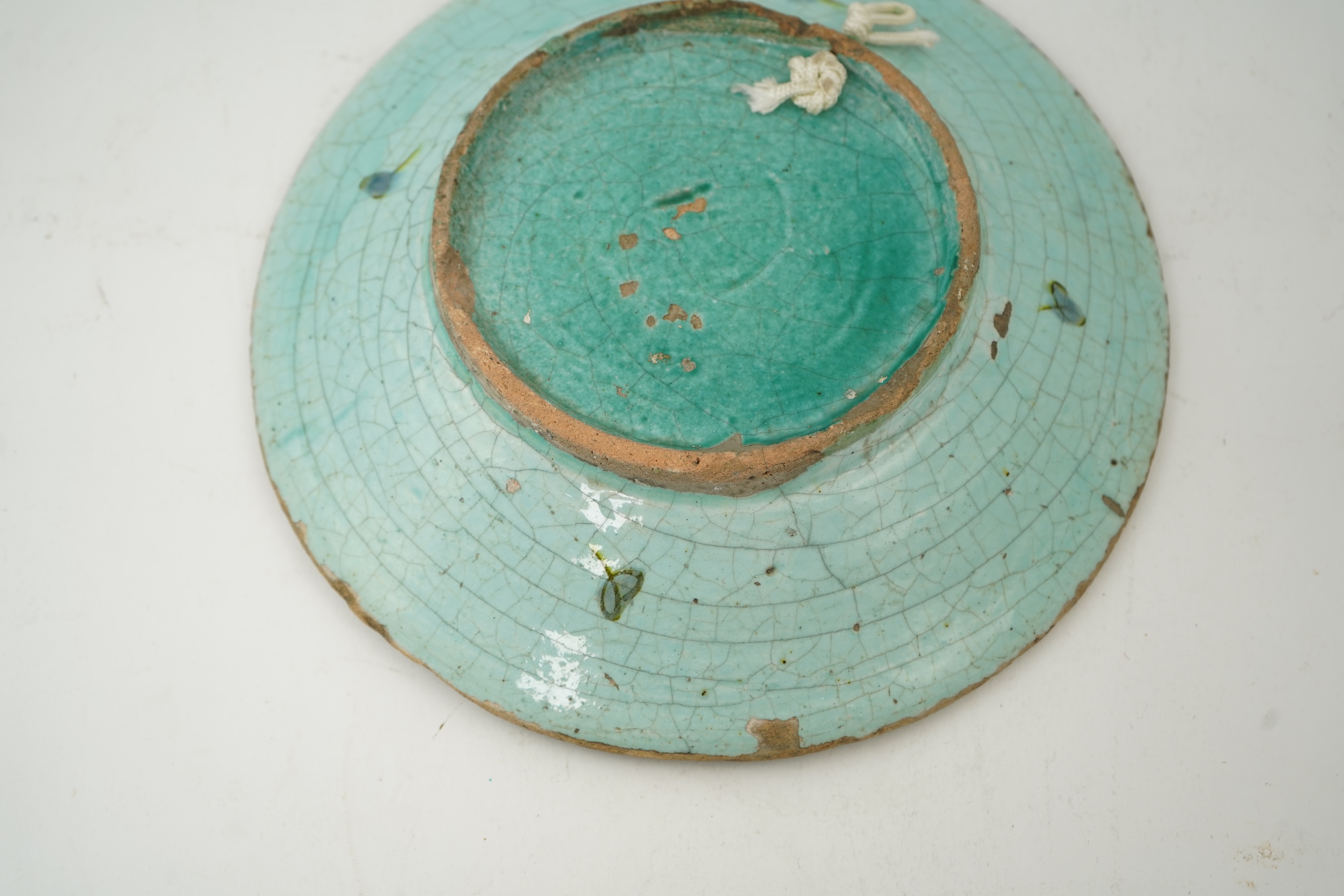 An Iznik pottery turquoise glazed dish, Ottoman Turkey, c.1650-1700